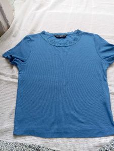 Blue Ribbed Lettuce Hem Top