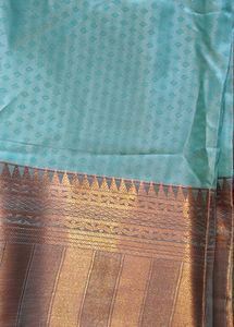 Elegant Turquoise Saree with Gold Border