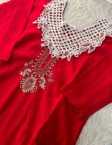 Elegant Red Kurta Set with Intricate White Necklin