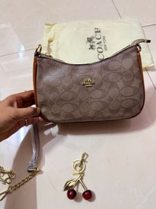Coach Monogram Cherry Charm Crossbody Bag