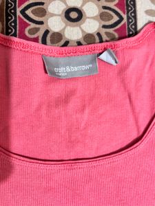 reddish pink T-shirt