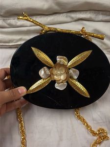 Designer Black Clutch with Gold Accents