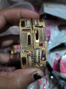 Elegant Gold Bangles with Intricate Design