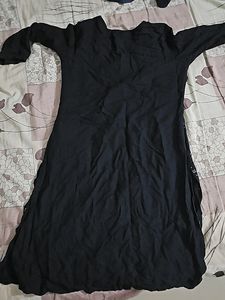 Its Black Top With Red And White Patterns
