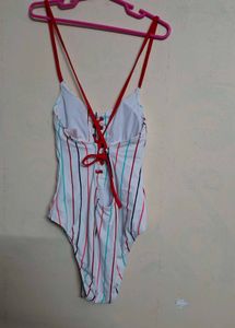 Striped One-Piece Swimsuit with Lace-Up Detail