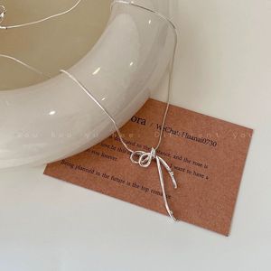 Silver Bow Pendant Necklace