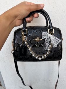 Coach Black Signature mini rowan (without charms)