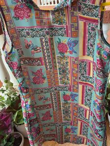 Vibrant print Sleeveless Dress with pock