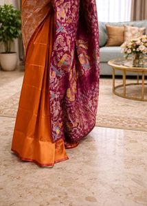 Stunning Orange Silk Saree with Purple Border