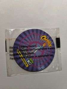 Rare Gwen tazo from Ben 10 by Cheetos - Sealed