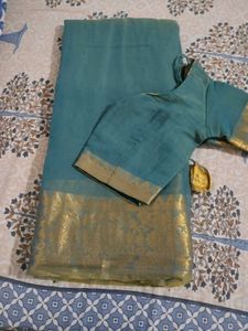 Elegant Teal Saree with Gold Border