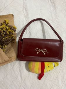 red maroon elegant hand bag