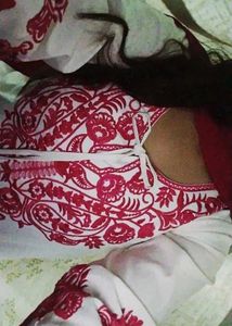 Embroidered red and white suit
