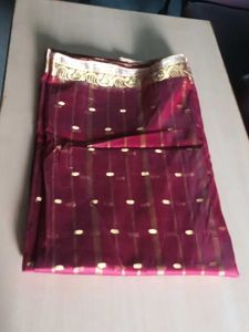 Elegant Maroon Saree with Gold Embellishments
