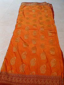 Vibrant Orange Silk Saree with Gold Motifs