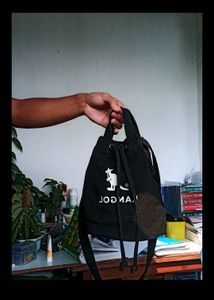 kangol bucket drawstring sling bag