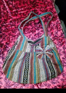 Boho Chic Striped Handbag with Bow Detail