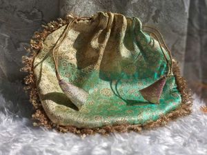 brocade pastel color potli bag