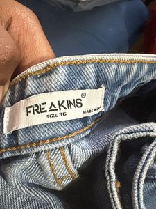 Distressed Light Wash Denim Jeans