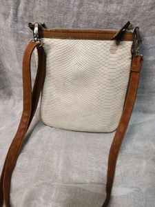 Authentic Guess snake patterned sling Bag
