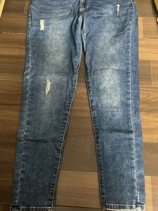 Distressed Blue Denim Jeans