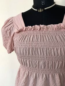Pink Smocked Puff Sleeve Peplum Top
