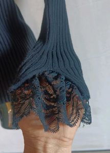 Black Ribbed Turtleneck with Lace Trim