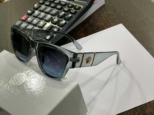 Versace Sunglasses - Stylish & Chic