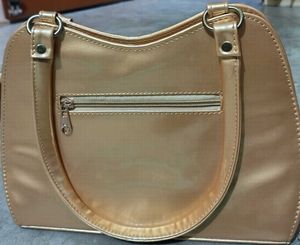 Elegant Gold Handbag with Swan Detail