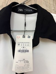 Zara Sleeveless Mini Dress with padded shoulder