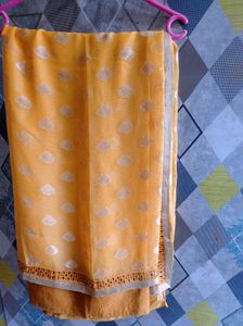 Elegant Yellow Saree with Silver Motifs