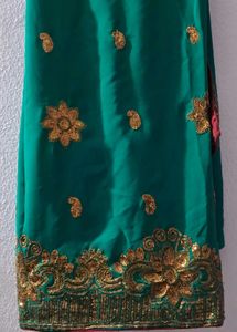 Elegant Teal Saree with Gold Embroidery