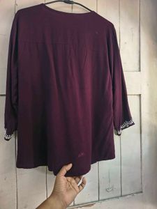 burgundry short kurti with minor flaw