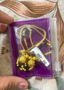 Elegant Gold Chain with Black Beads
