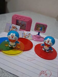 Cadbury doremon 2 figures , time tv and alb