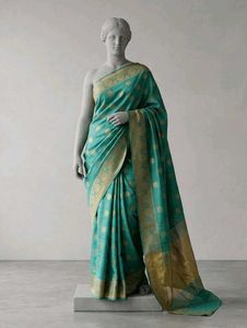 Elegant Teal Saree with Gold Border
