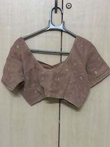 pastel pink blouse