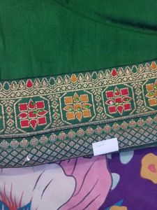 Elegant Green saree with Embellished Border