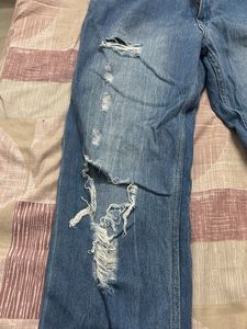Distressed Blue Denim Jeans