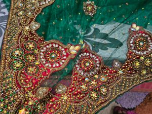 Ravishing Heavy Green Net Saree