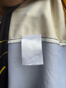 New Balance Long Sleeve Black Yellow Shirt