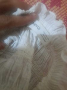 A one string cotton crop top mango