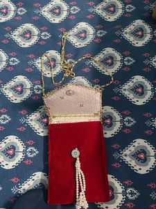 Embellished Clutch with Pearl Tassels