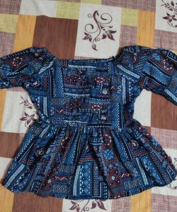 Patterned Peplum Top