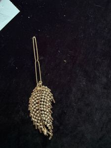 feather with diamond clips