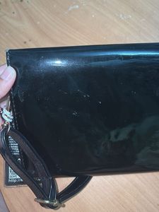 Shiny Black Clutch with Apple Embellishment