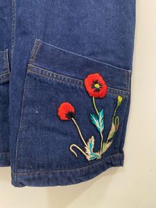Chic Denim Pinafore Dress with Floral Embroidery