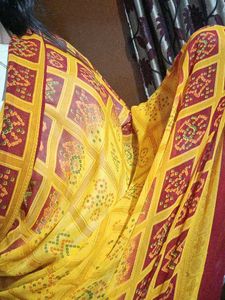 red and yellow saree
