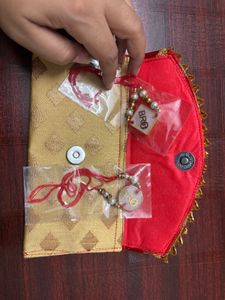 Pack Of 2 Resin Rakhi With A Money Holder