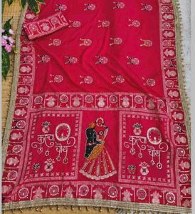 Vibrant Red Saree with Peacock Motif